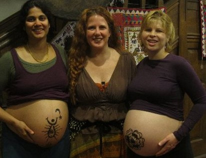 Henna paste pregnant belly design