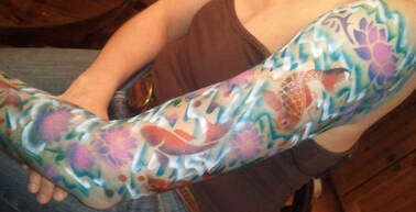 Koi fish airbrush tattoo sleeve