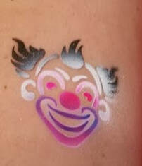 Clown face airbrush tattoo