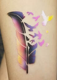 feather birds flying off airbrush tattoo design