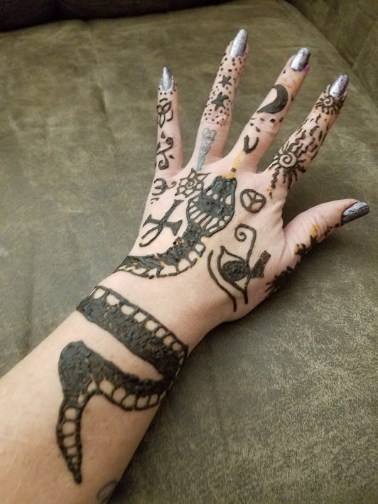 Halloween fortune teller henna designs