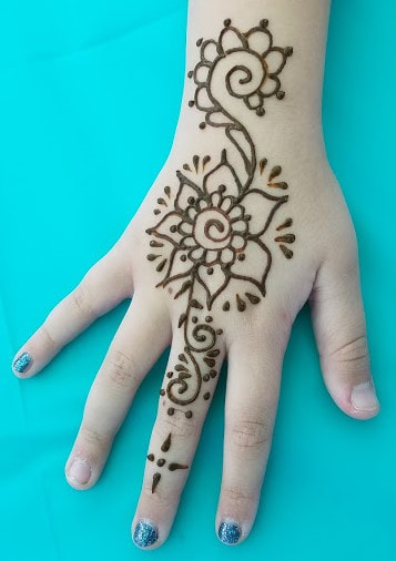 Henna tattoo on hand flower design 2