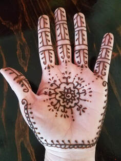 Flower on palm of hand henna design 1