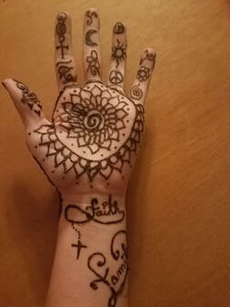 Flower on palm of hand henna design 2