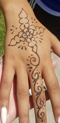 Simple flower henna tattoo design