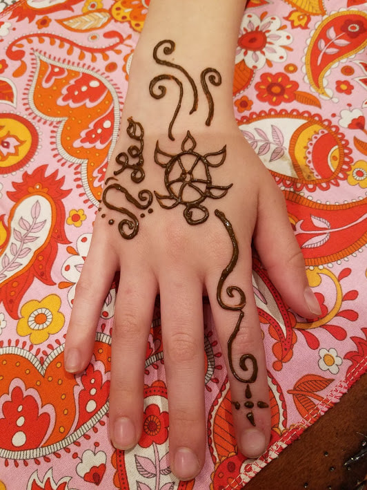 turtle henna design on hand