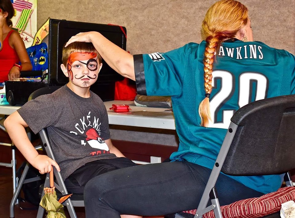 WFA Linda in action face painting pirate